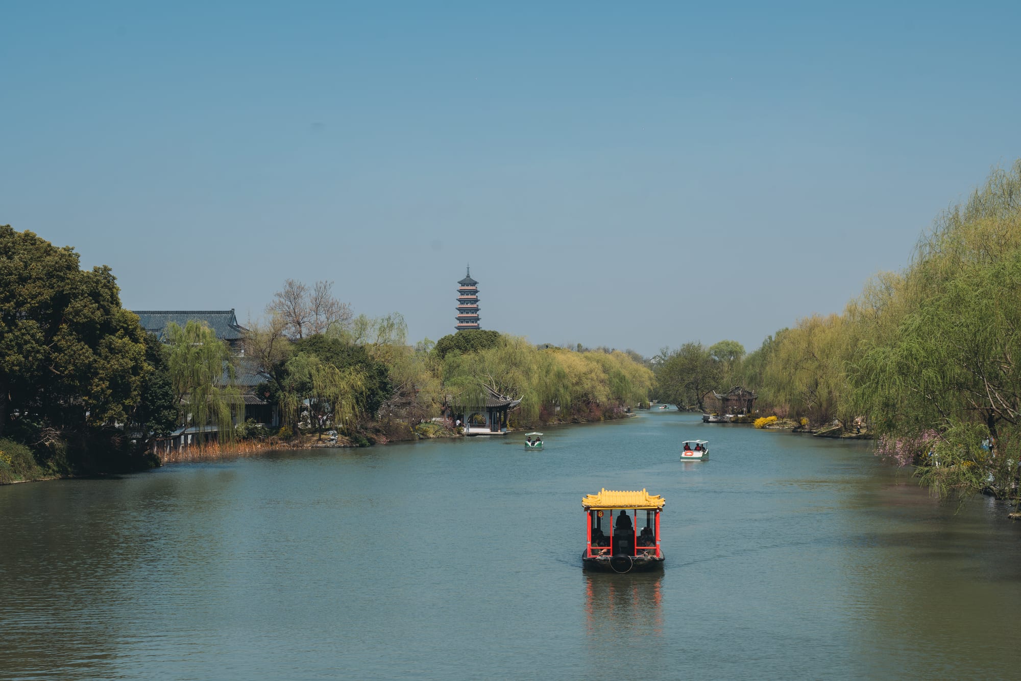 Slender West Lake with a boat and pagoda